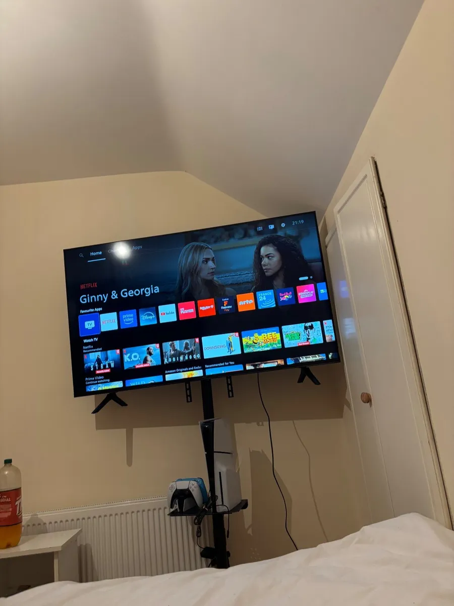 PlayStation 5 and 55 inch Television