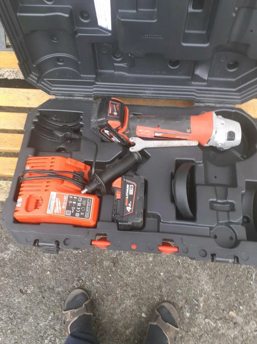 Milwaukee angle grinder as new 2 batteries an char - Image 1