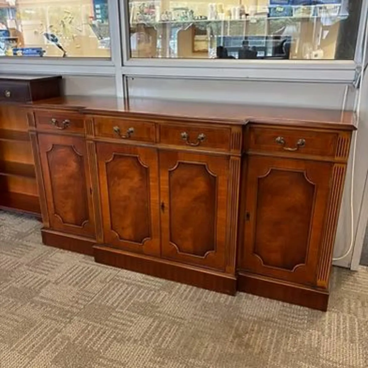 Beautiful mahogany flamed Bevan Funnell breakfront