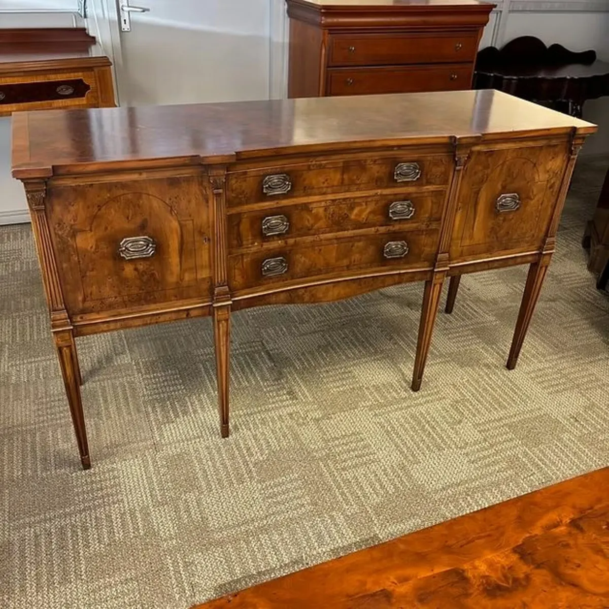 Fabulous walnut regency style concaved front sideb
