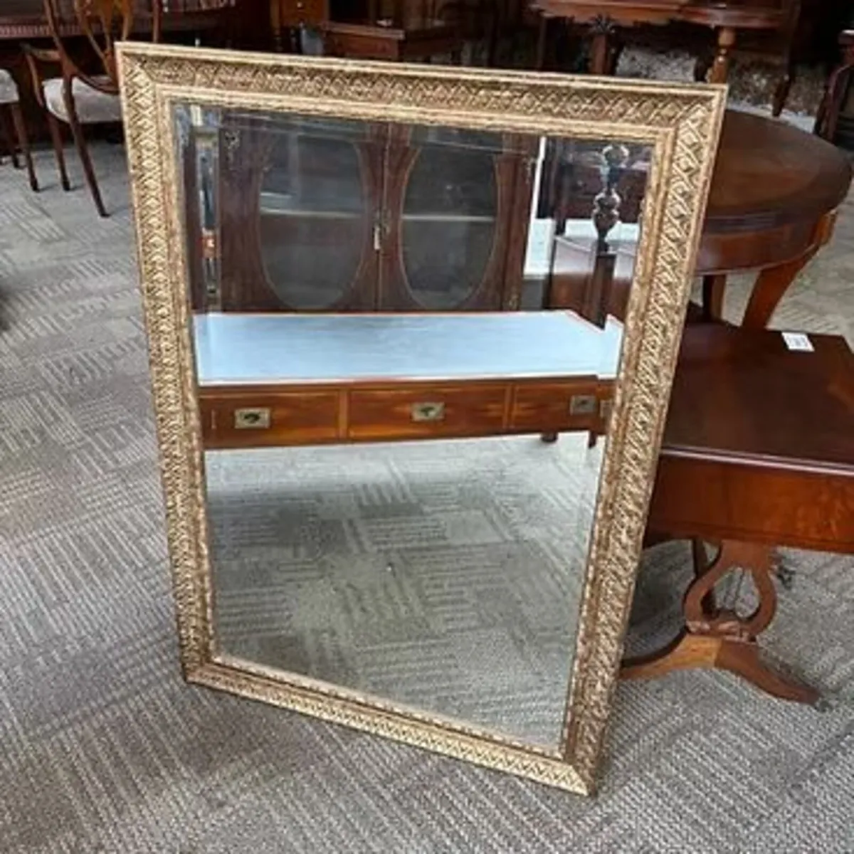 Beautiful ornate gilt wall bevelled mirror