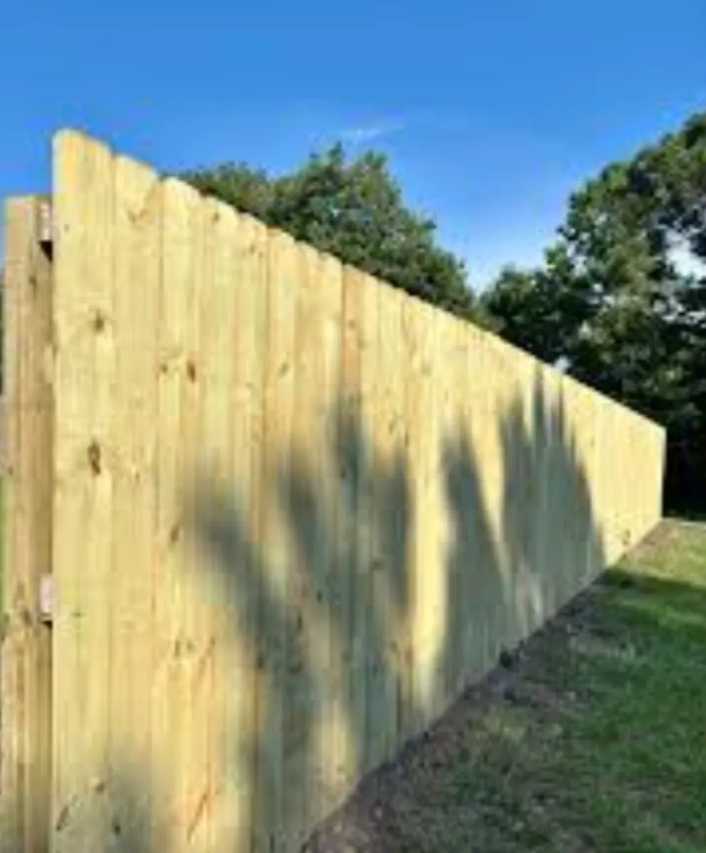 Putting up new fencing - Image 1