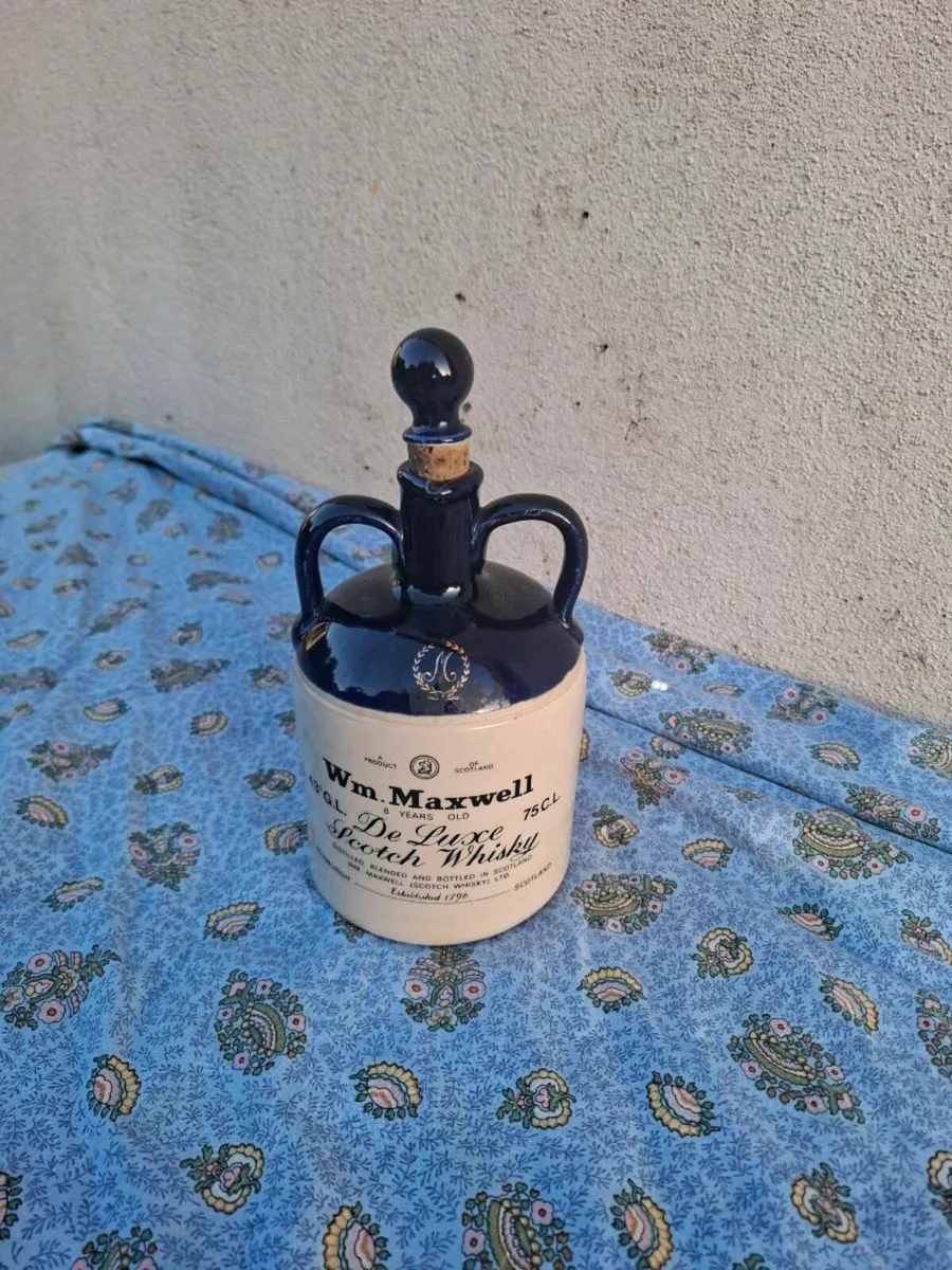 Whiskey bottle postage possible