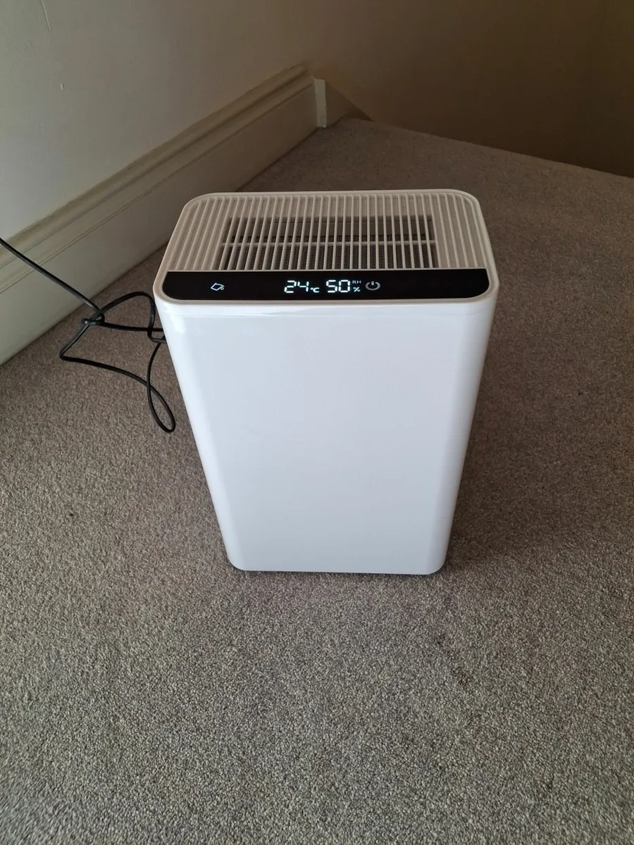 New Dehumidifier and Air Purified - Image 1
