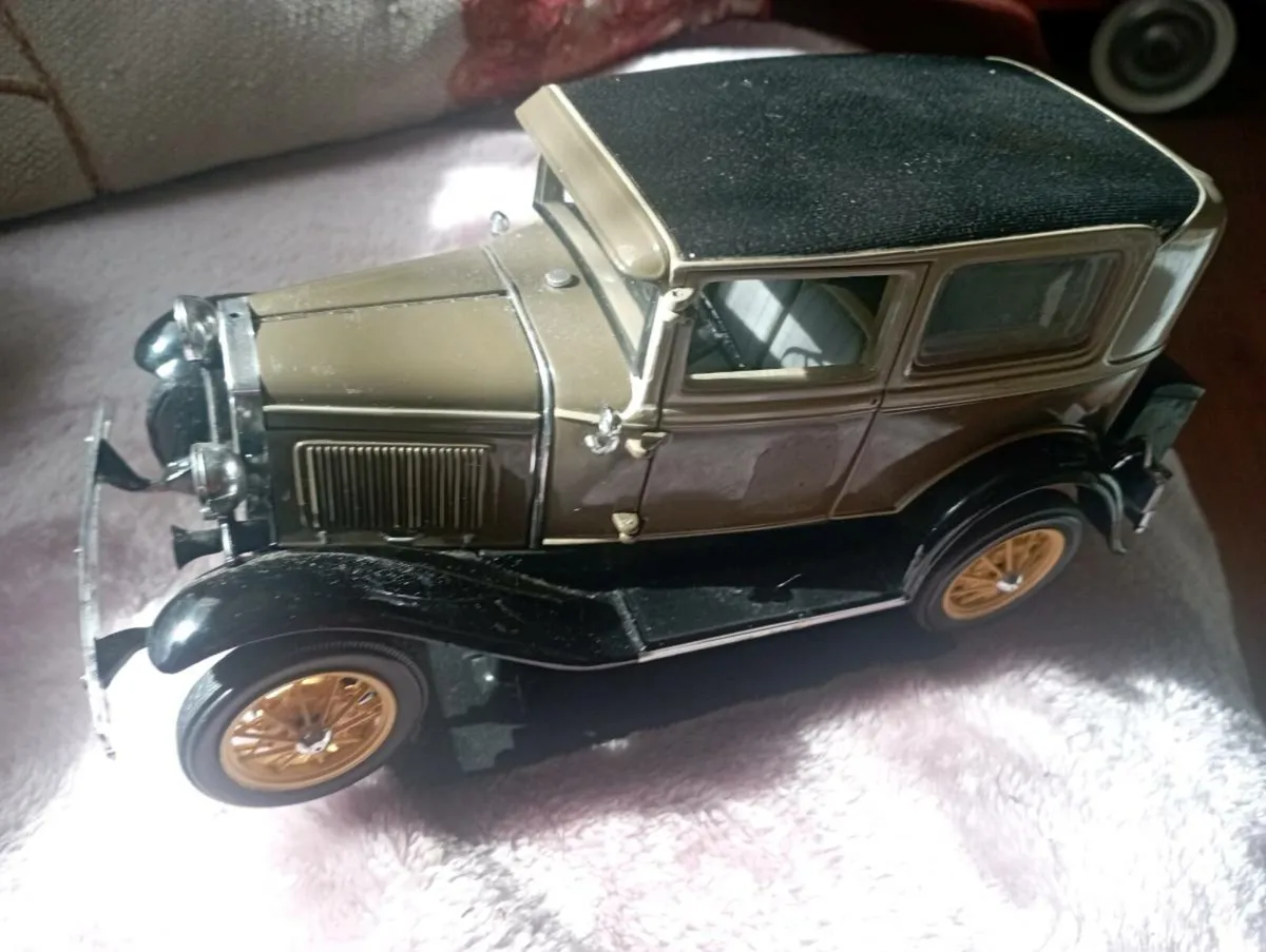 SUN STAR  VINTAGE FORD  MODE A TUODR SADAN 1931 - Image 1