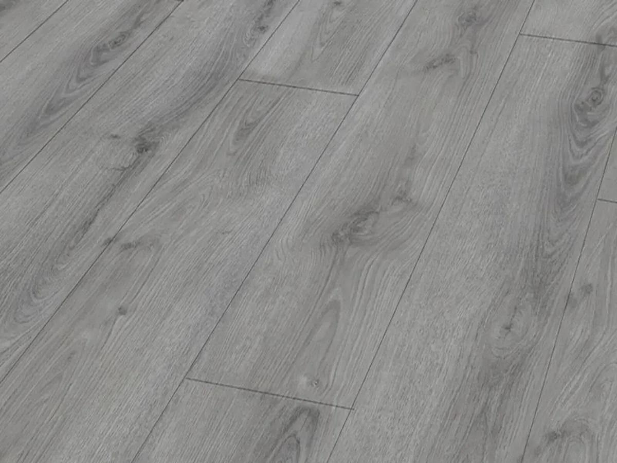 Brand new laminated 8mm flooring - Image 1