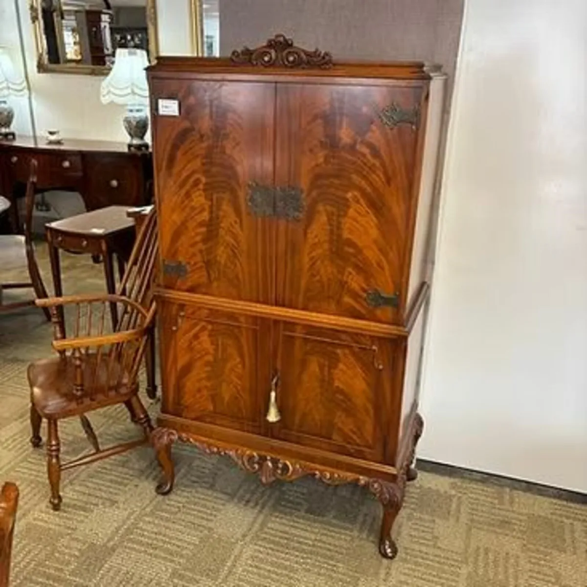 Mid 20th century mahogany flamed drinks cabinet. H - Image 1