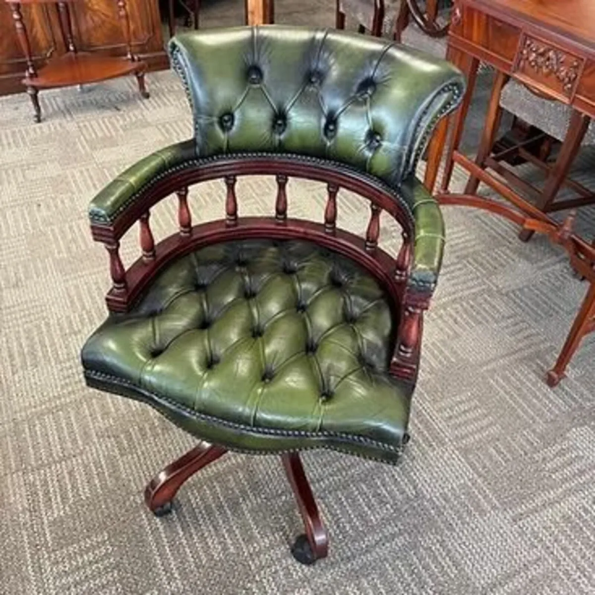 Fabulous green leather mahogany framed button back