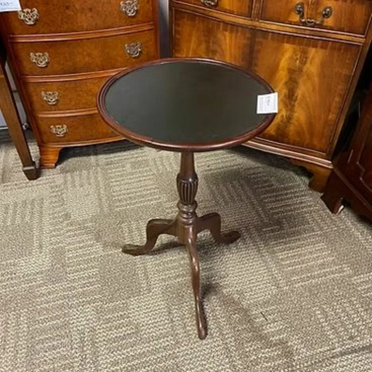 Beautiful mahogany round wine green leather top ta