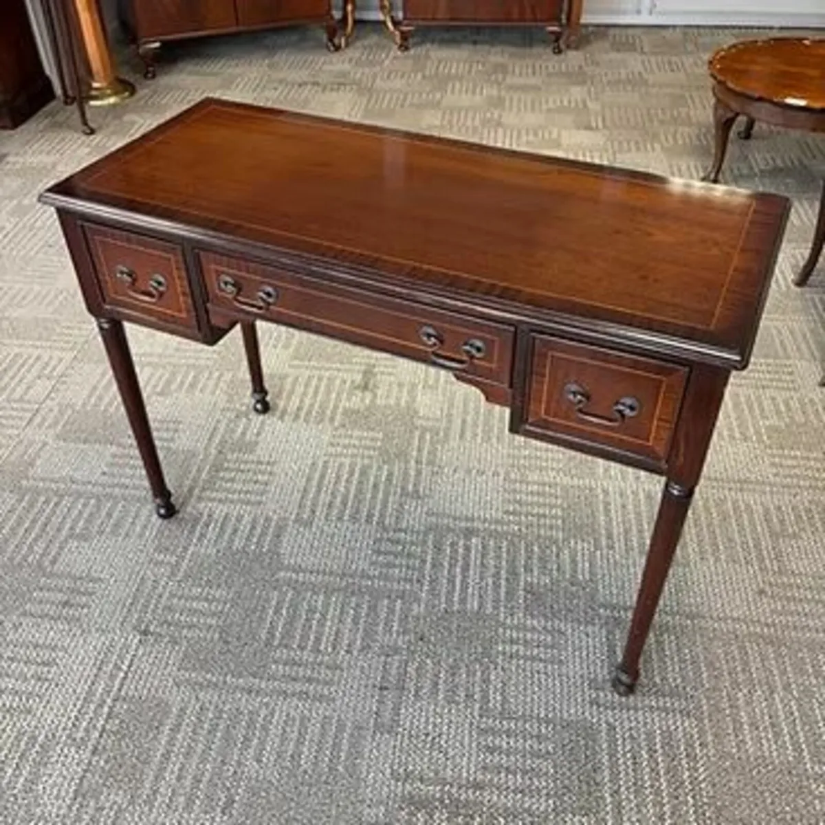 Beautiful mahogany three drawer lowboy console tab