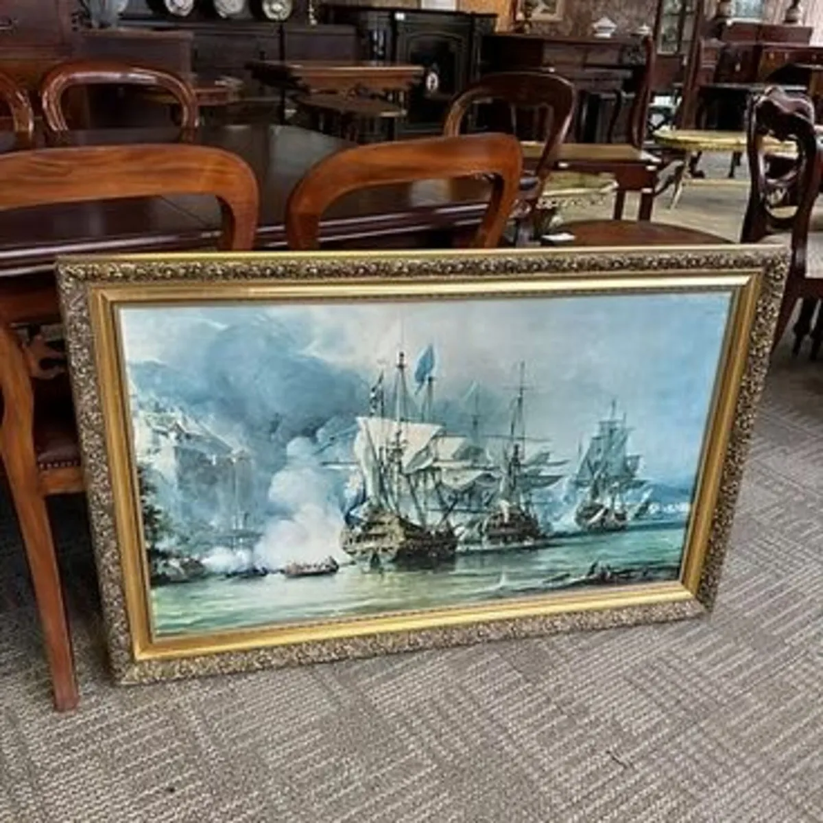 "Naval battle scene" print on canvas. Mounted gilt