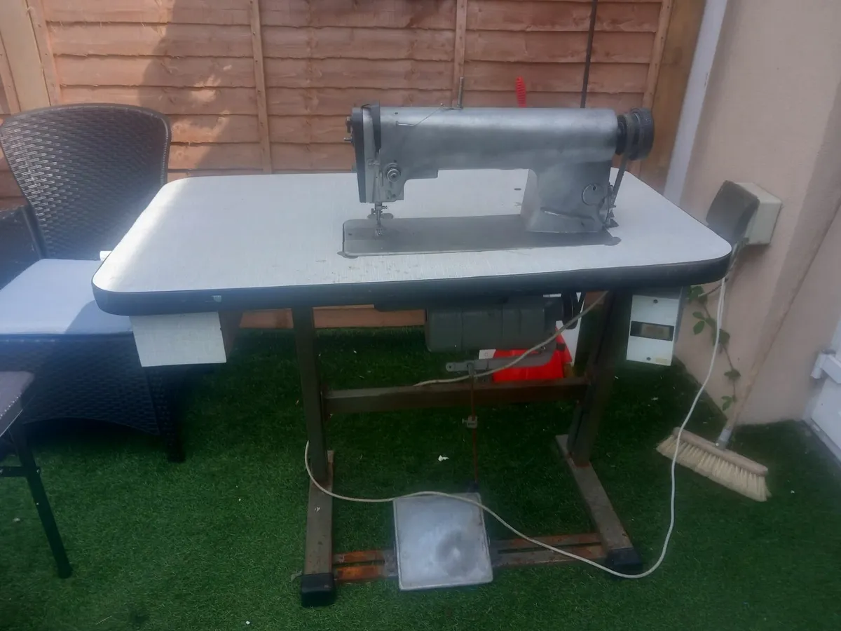 industrial sewing machine in working condition . c - Image 1