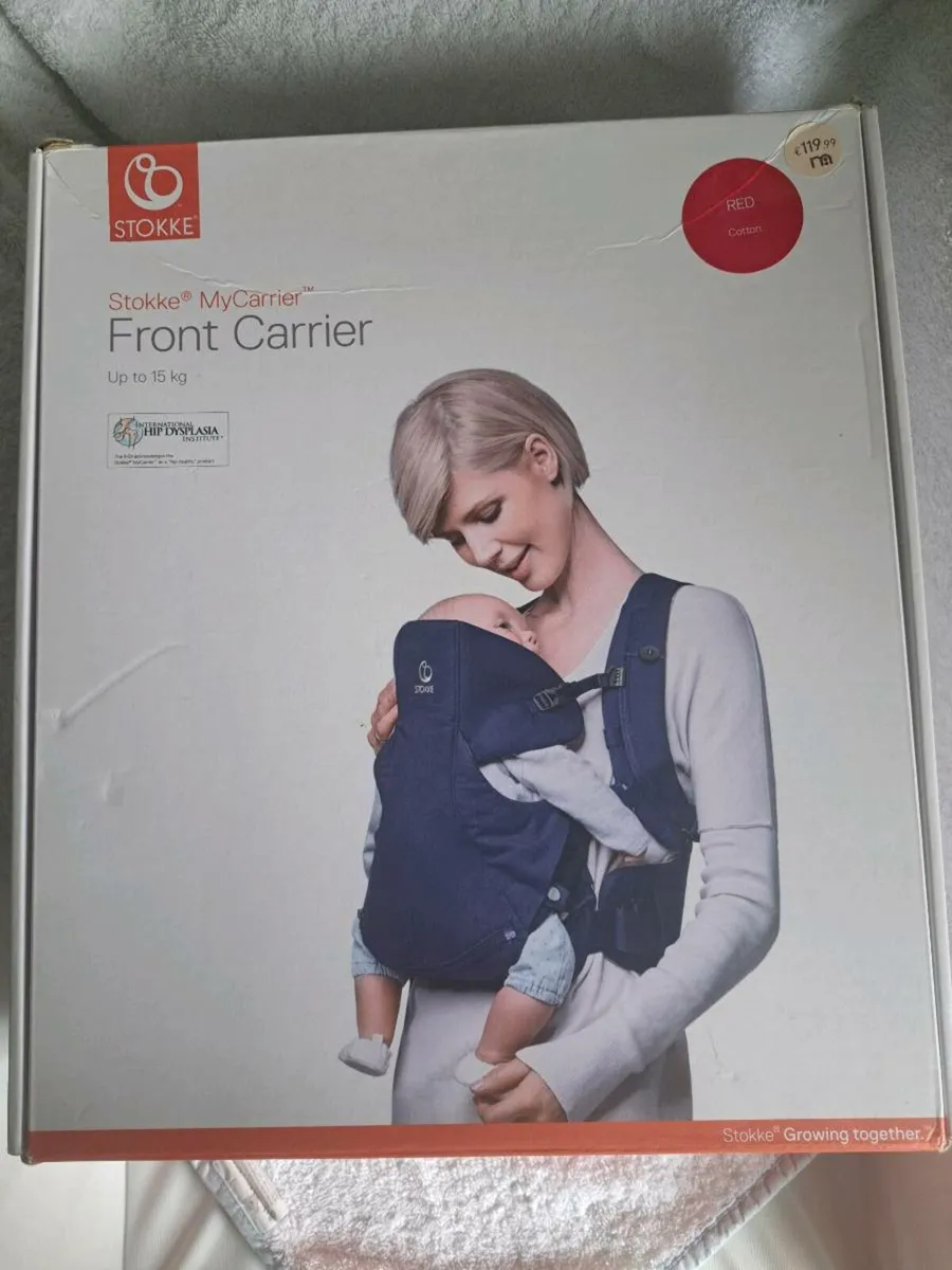 Stokke red baby carrier - Image 1
