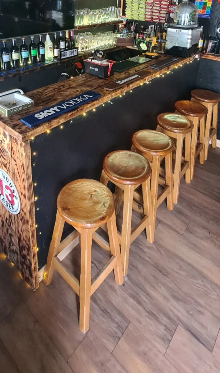 Bar stools & Whiskey Barrels - Image 1