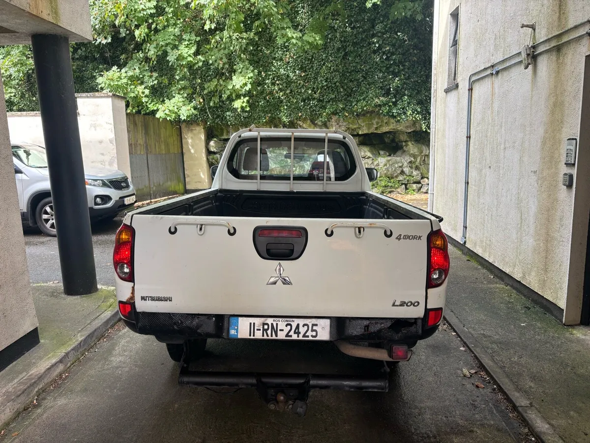 2011 l200 with low mileage 64k - Image 3