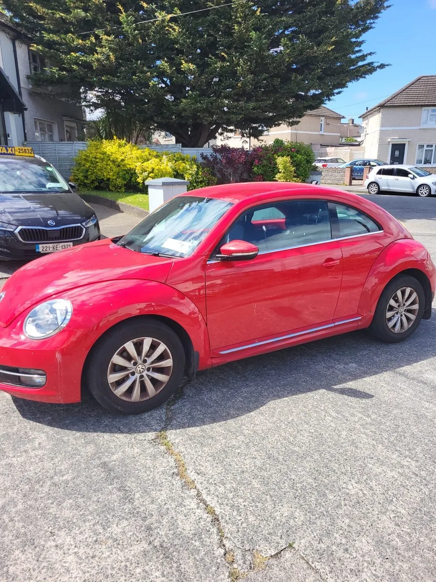 Red Volkswagen Beetle - Image 1