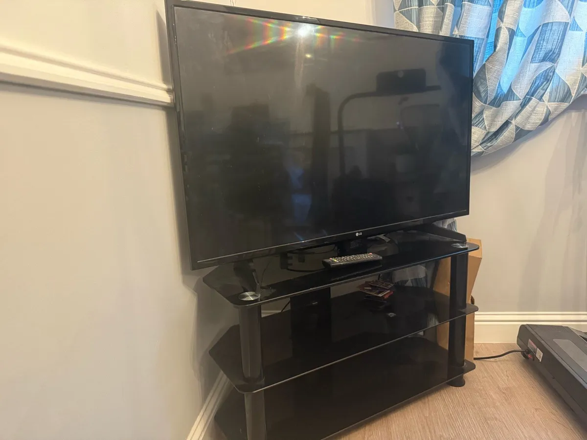 42’ Flatscreen TV + Cabinet - Image 2