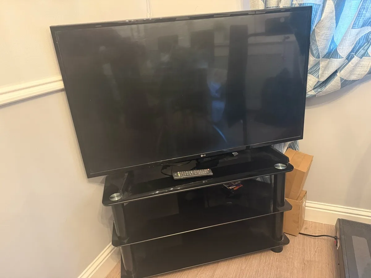 42’ Flatscreen TV + Cabinet - Image 3