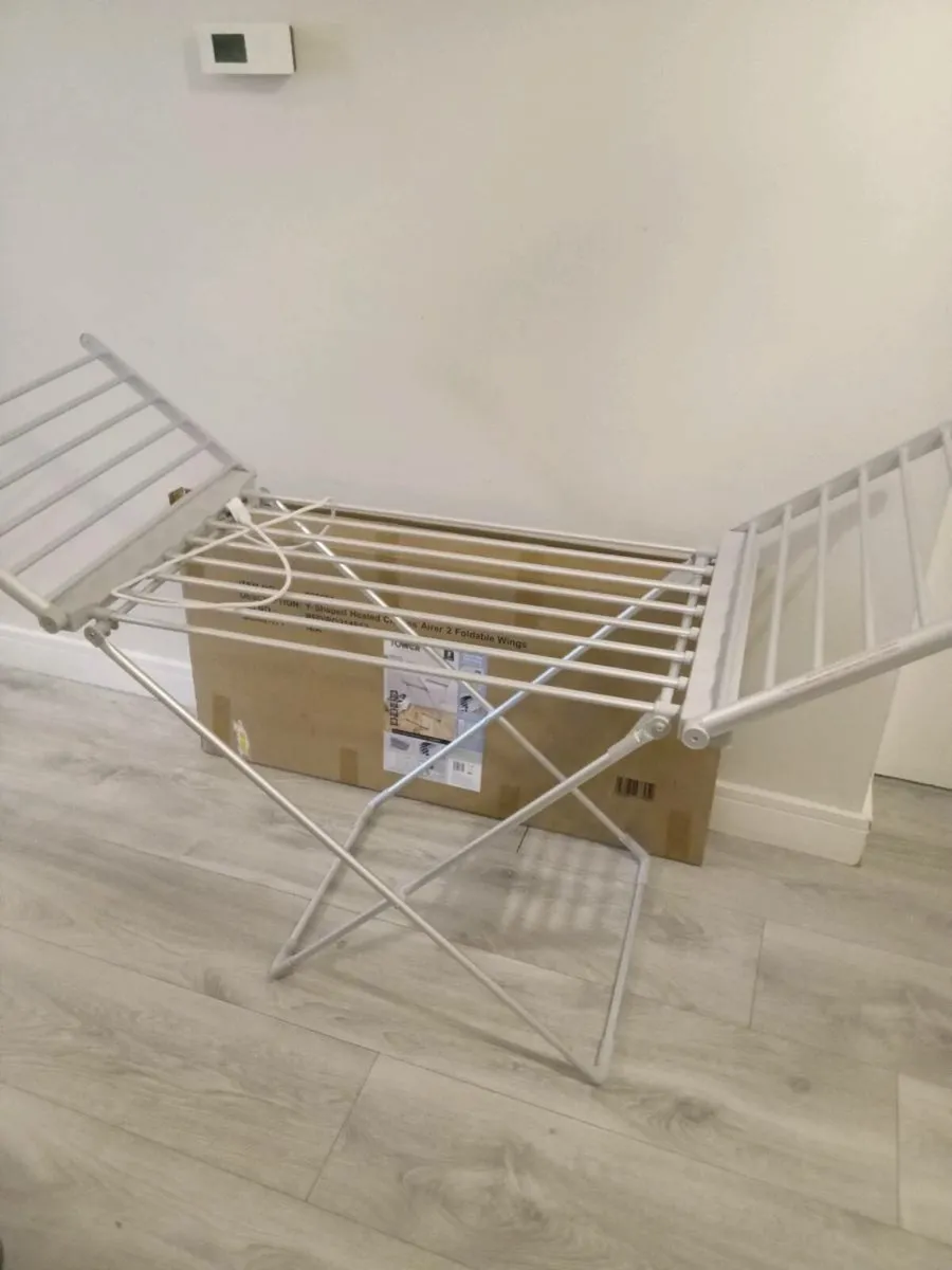 Electric clothes dryer stand - Image 1