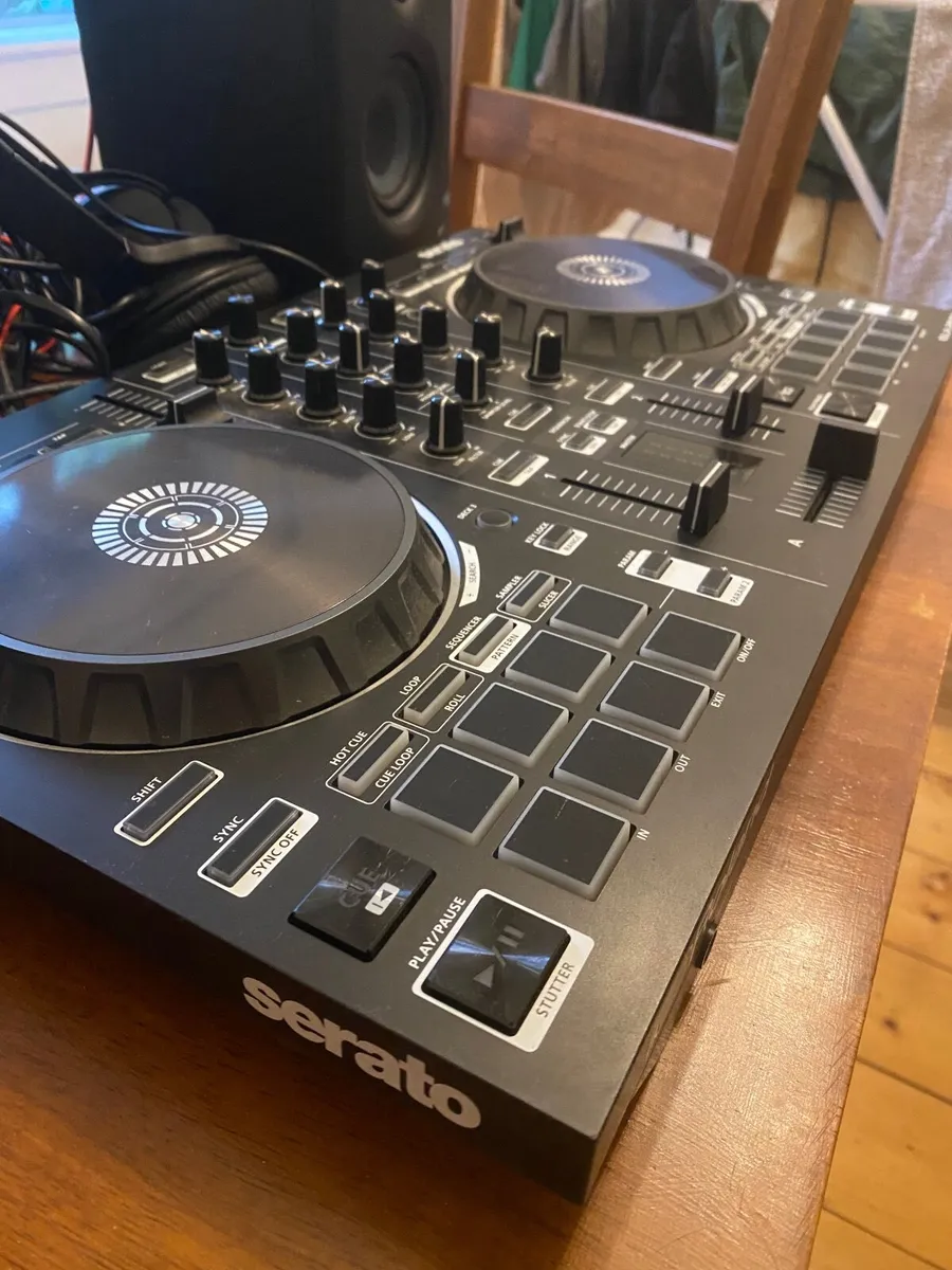 Roland DJ-202 Decks with headphones and speakers - Image 1