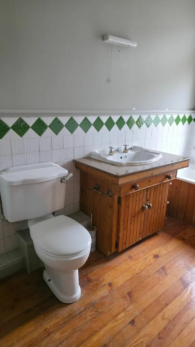 Bathroom sink and taps with marble shelf