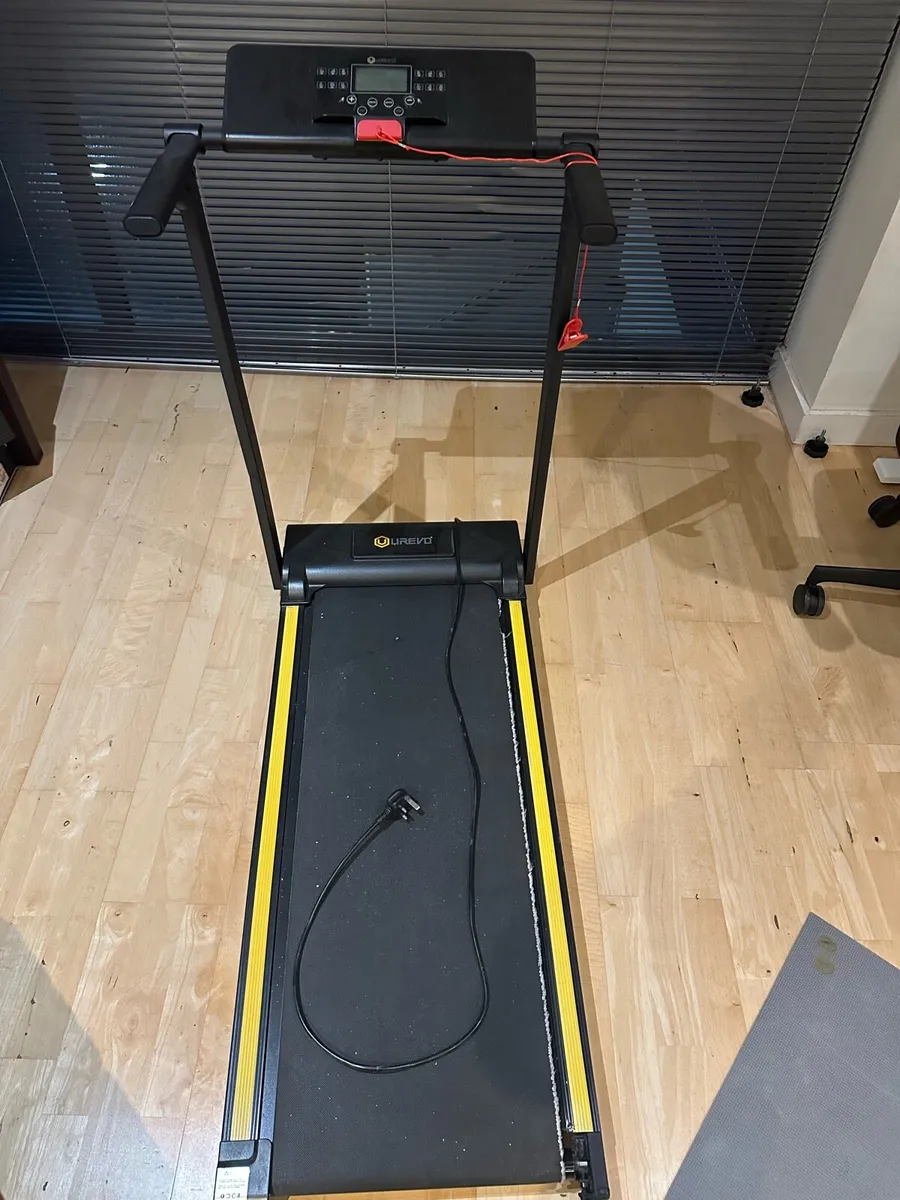 Folding under desk walking pad tread mill - Urevo - Image 1