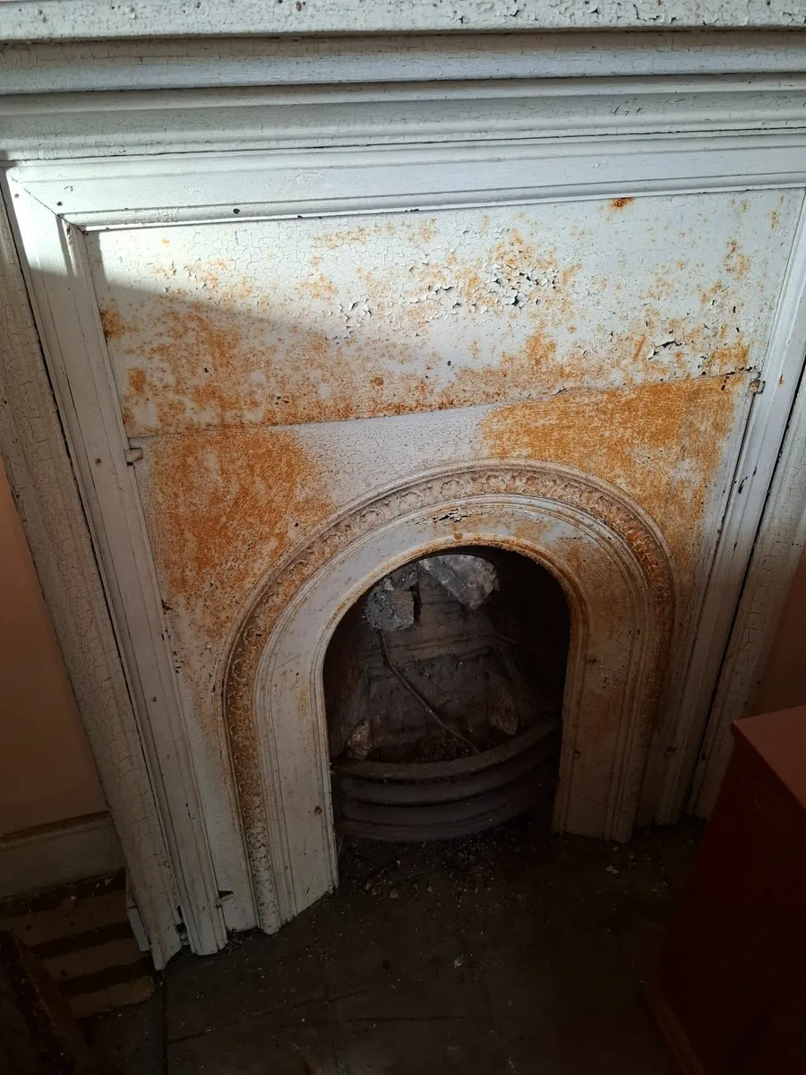 Antique cast iron fireplace