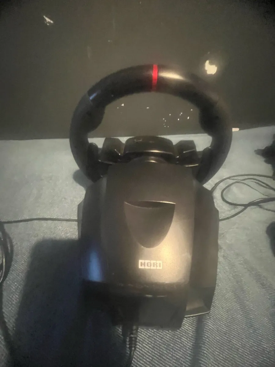 A Xbox steering wheel and pedals - Image 2