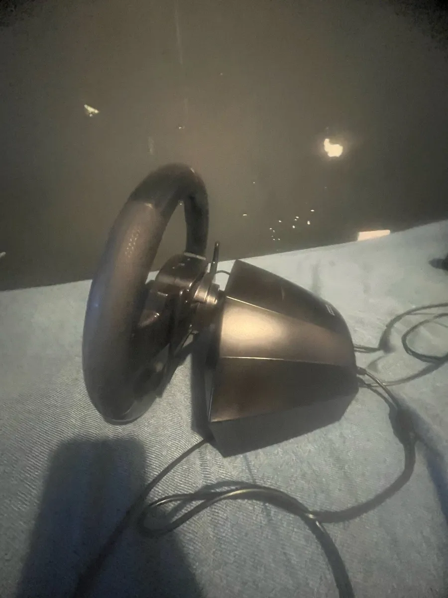 A Xbox steering wheel and pedals - Image 3