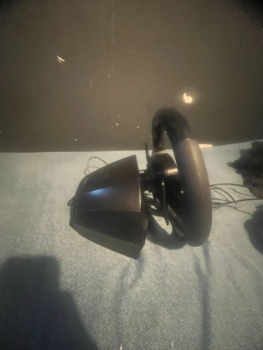 A Xbox steering wheel and pedals - Image 4