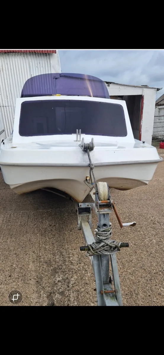 Dory boat trailer and engine - Image 1