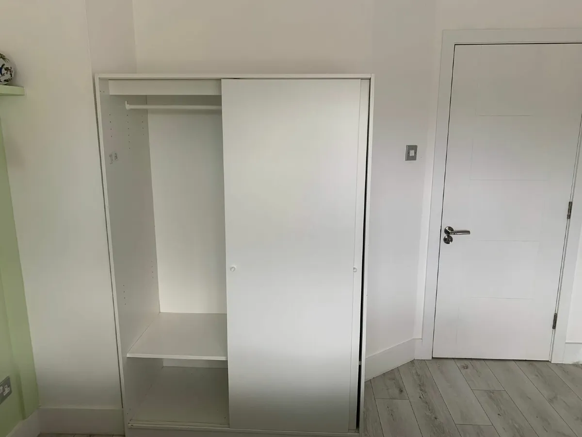 Ikea white wardrobe with sliding doors - Image 1