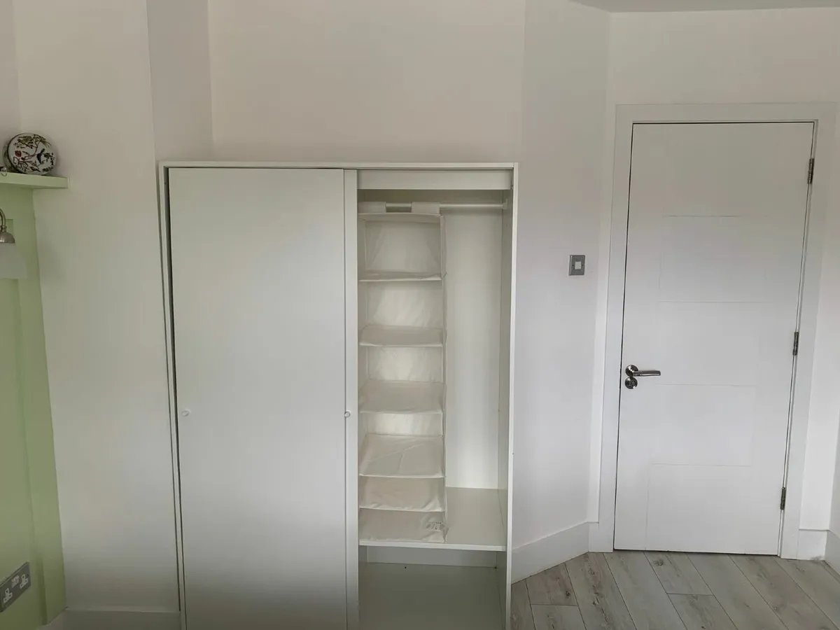 Ikea white wardrobe with sliding doors - Image 2