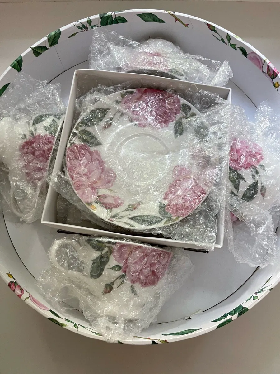 Newbridge Rose Collection Four teacups and saucers - Image 1