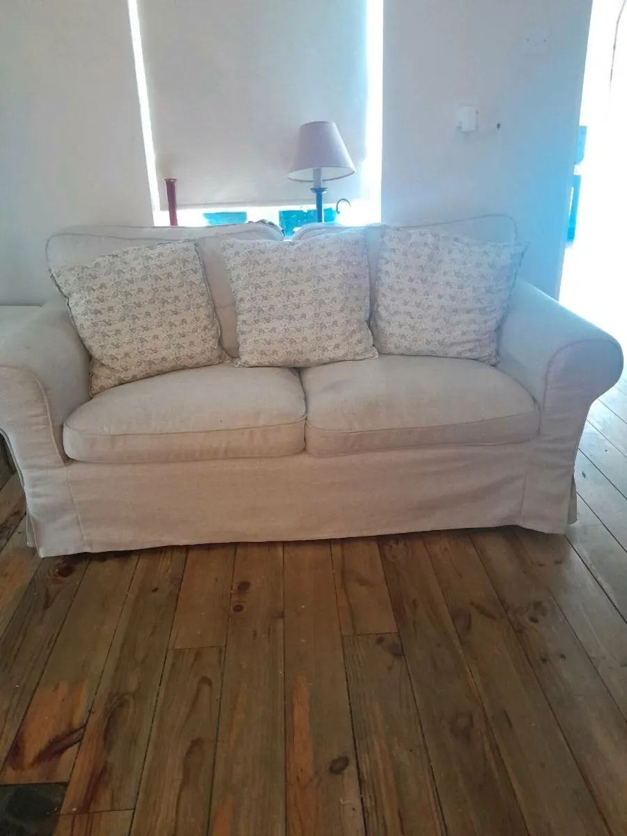 Extorp 2 seater couch and tan arm chair - Image 1