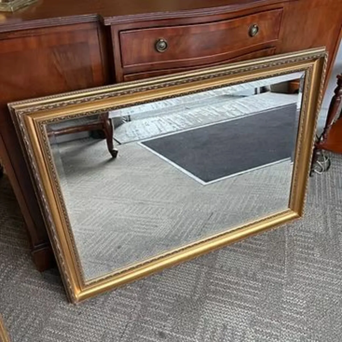Beautiful bevelled ornate gilt wall mirror