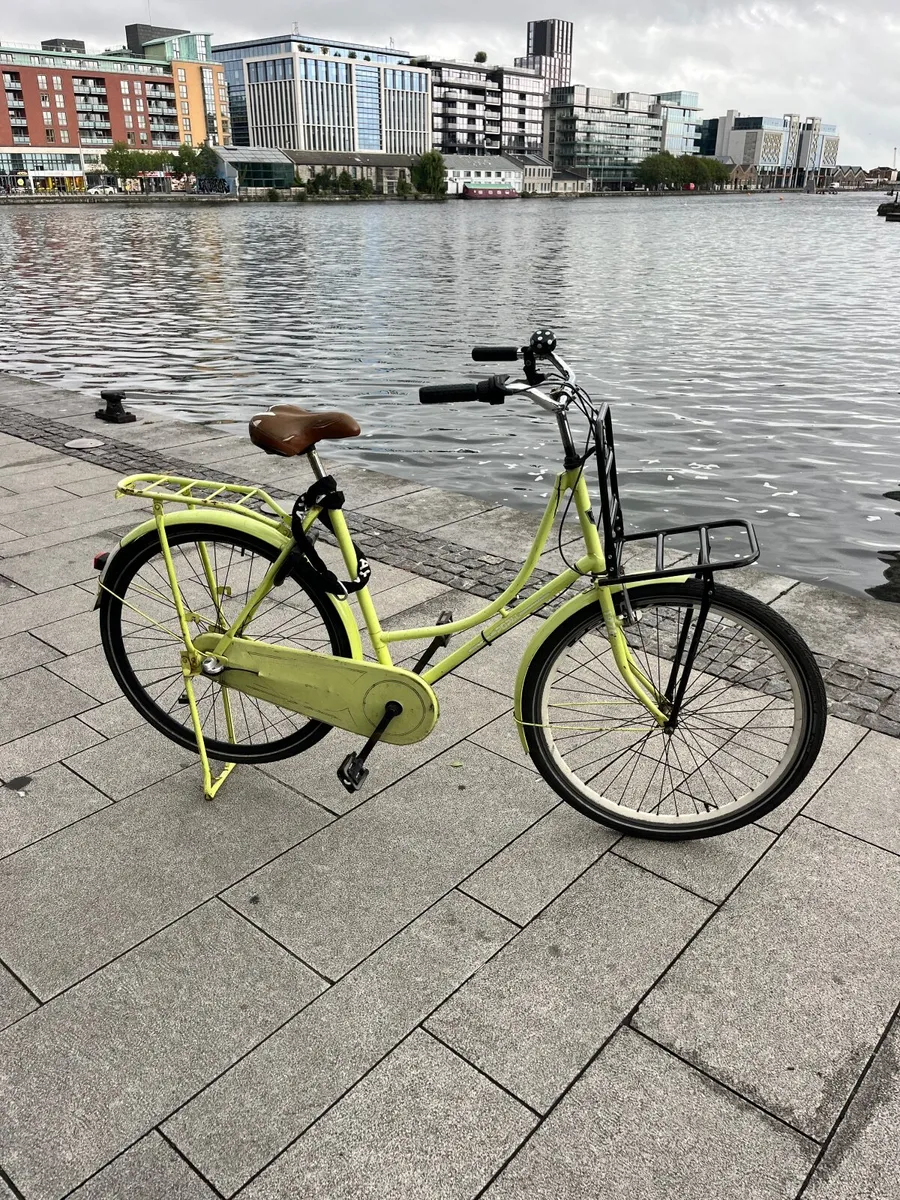 Bright yellow Dutch bike - Image 1