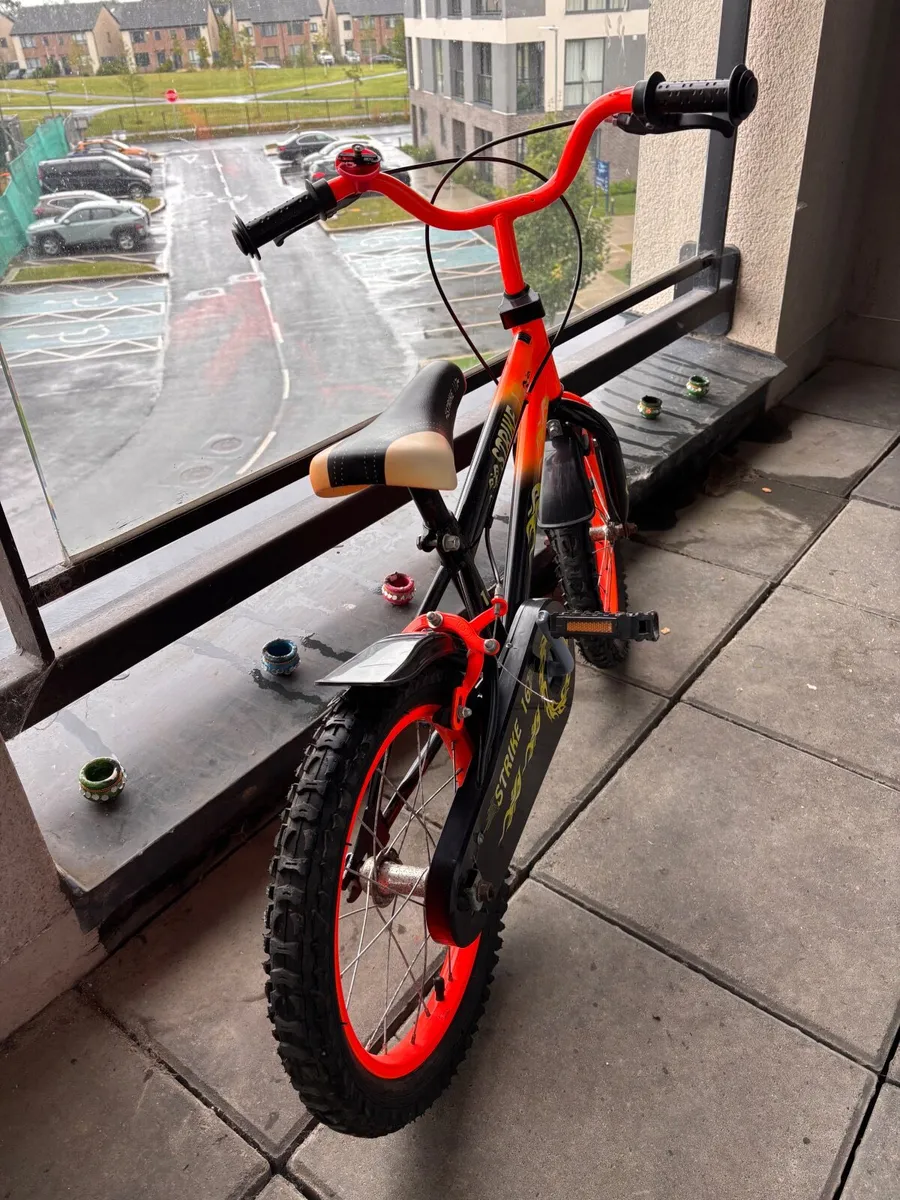 12 Inch Strike Bike Orange and Black - Image 1