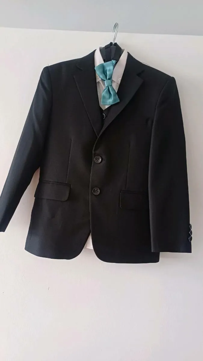 Boys  black and navy suits. - Image 1