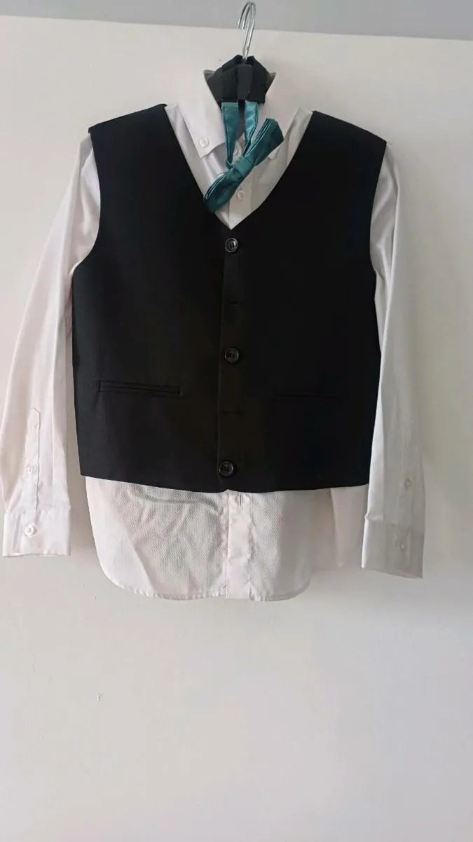 Boys  black and navy suits. - Image 2