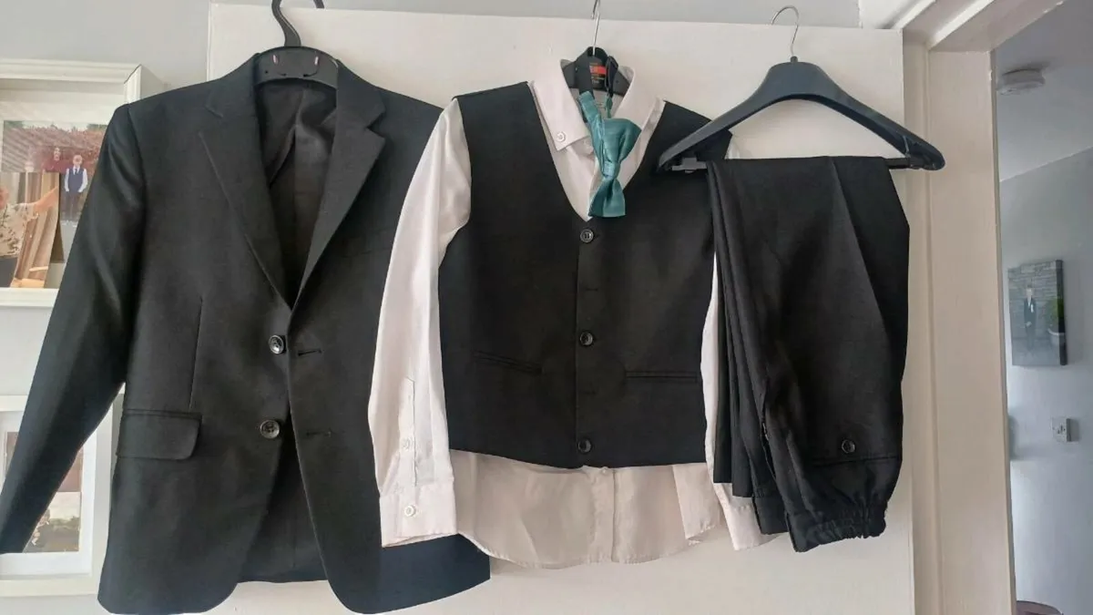 Boys  black and navy suits. - Image 4