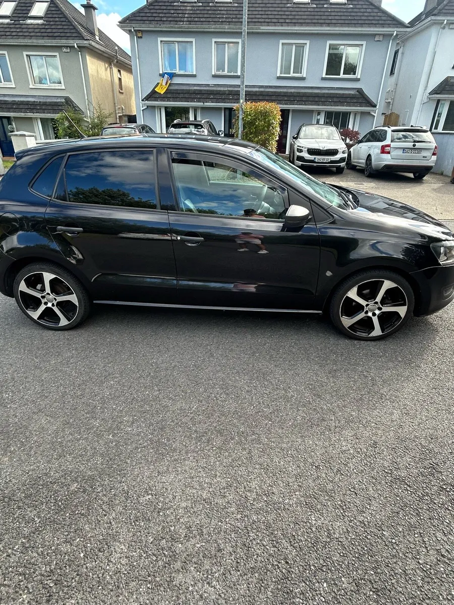 2011 Black Volkswagen Polo - Image 1