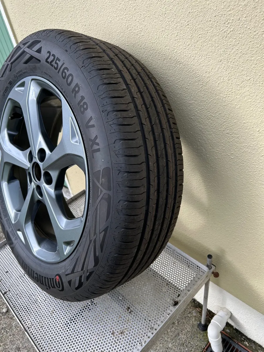 A full set of alloys with tyres never used - Image 1