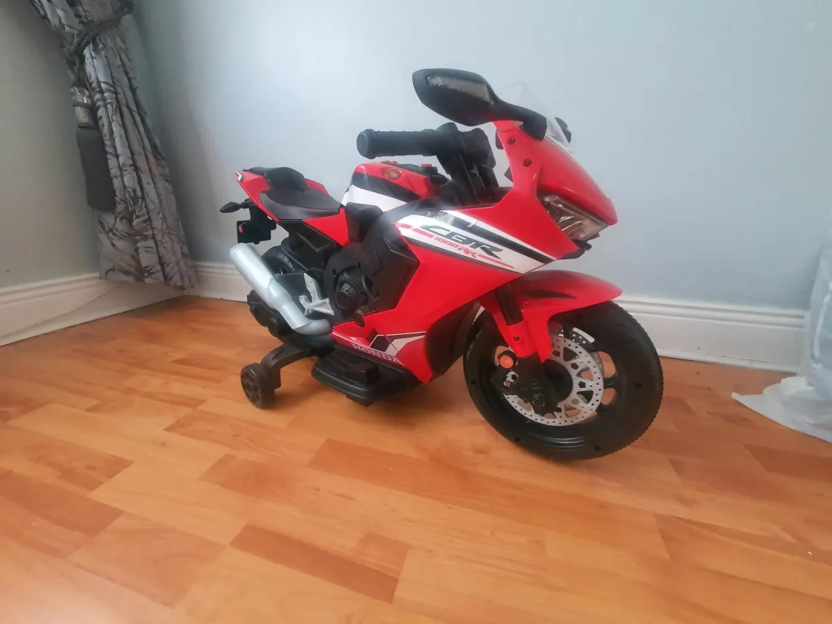 Cot bed childs electric bike - Image 4