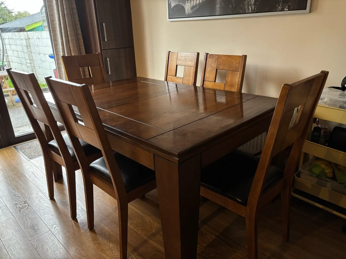 Oak Varnish Dining Table - Extendable (6-8 Seater) - Image 1