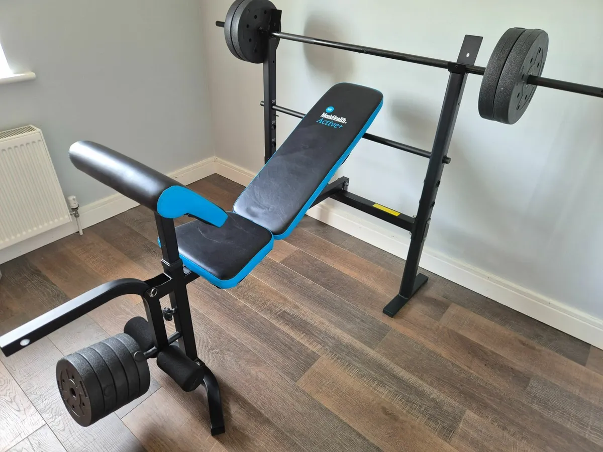 Foldable weight lifting bench and 50kg weight set - Image 1