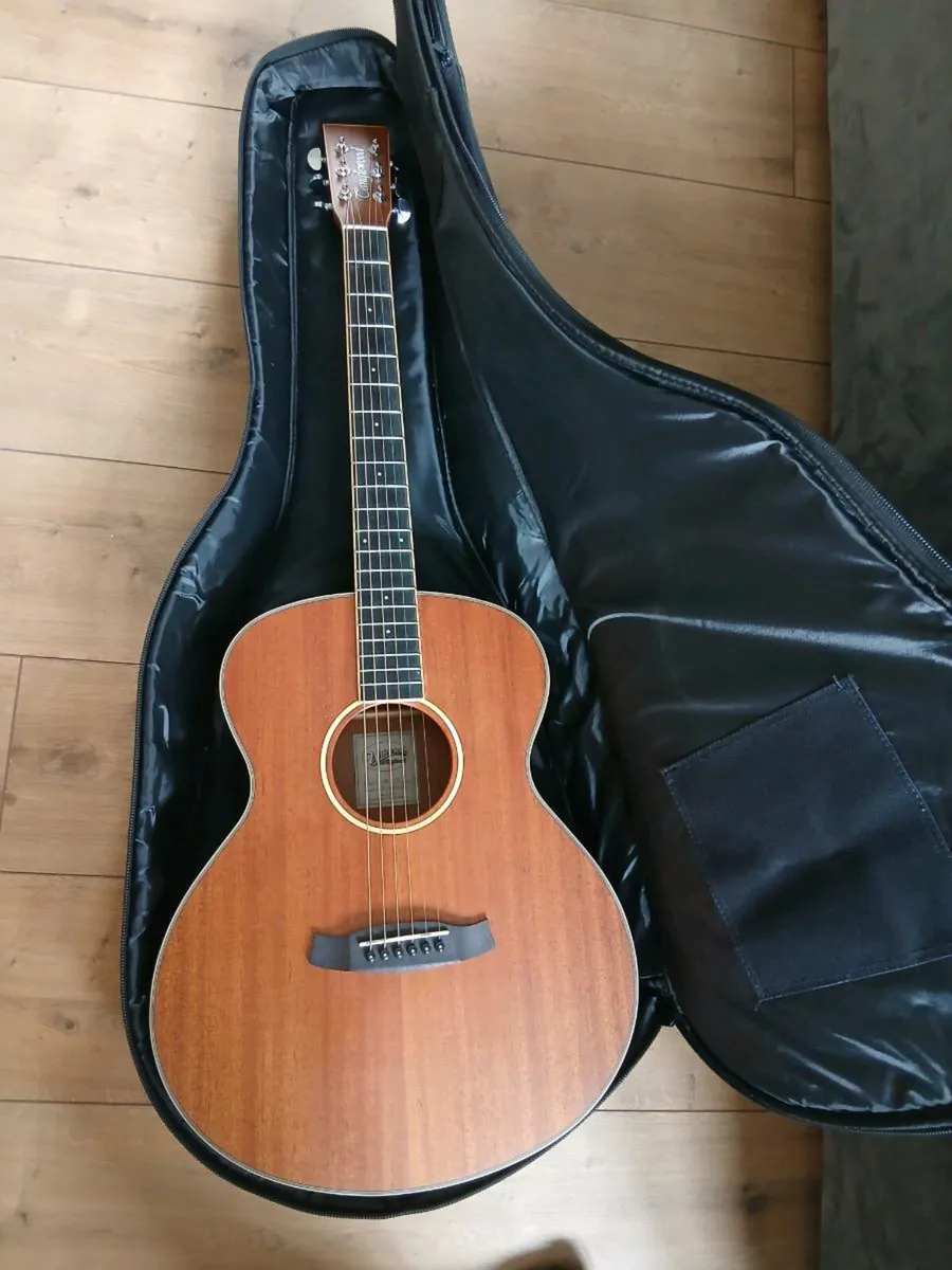 Guiter - Image 1