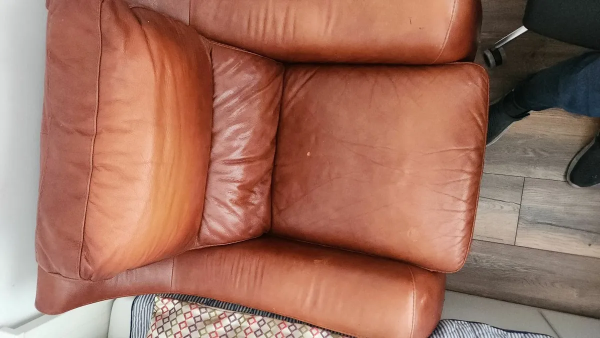 Leather armchair and footstool - Image 1