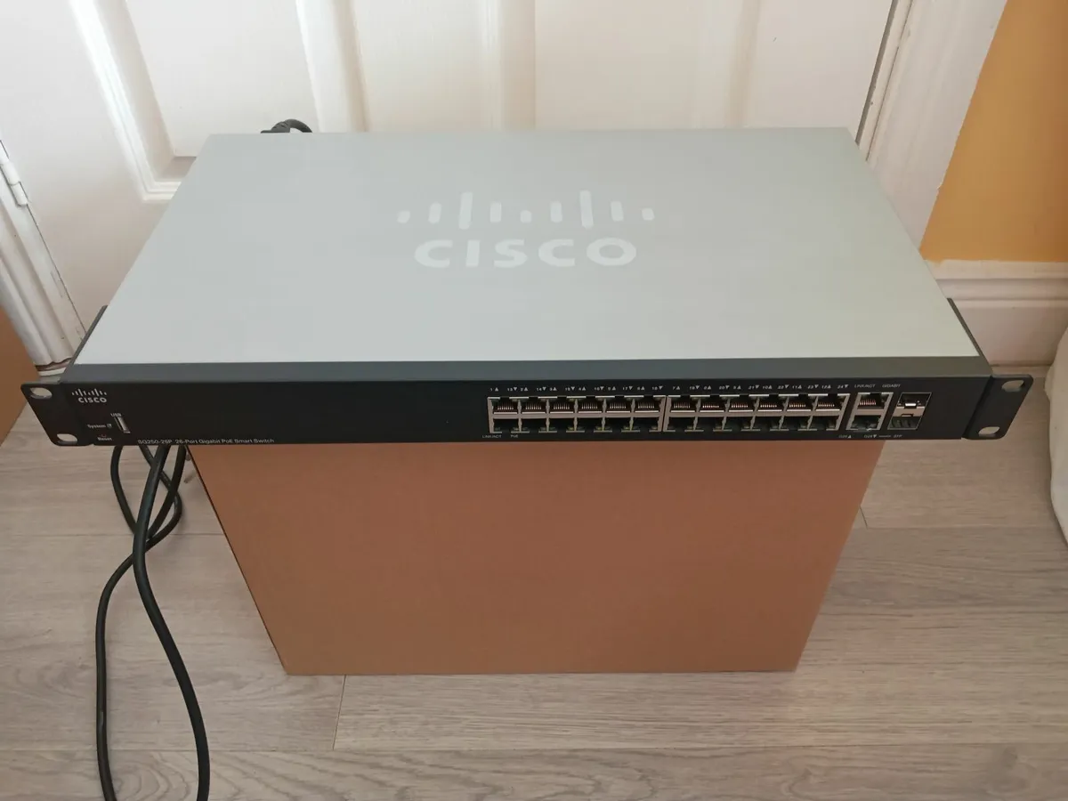 Postage - Cisco SG250-26P-K9 V04 26-Port Gigabit P - Image 1