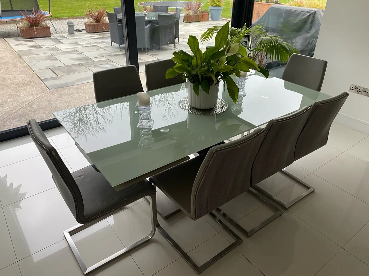 Large Extendable Dining Table with 8 chairs - Image 1